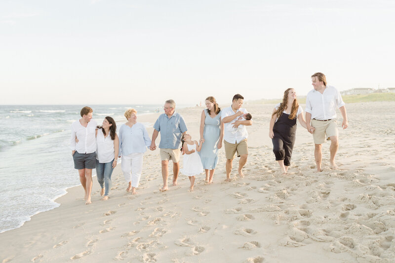 Elegant and candid extended family beach photos captured by a luxury photographer in Ocean City, NJ.