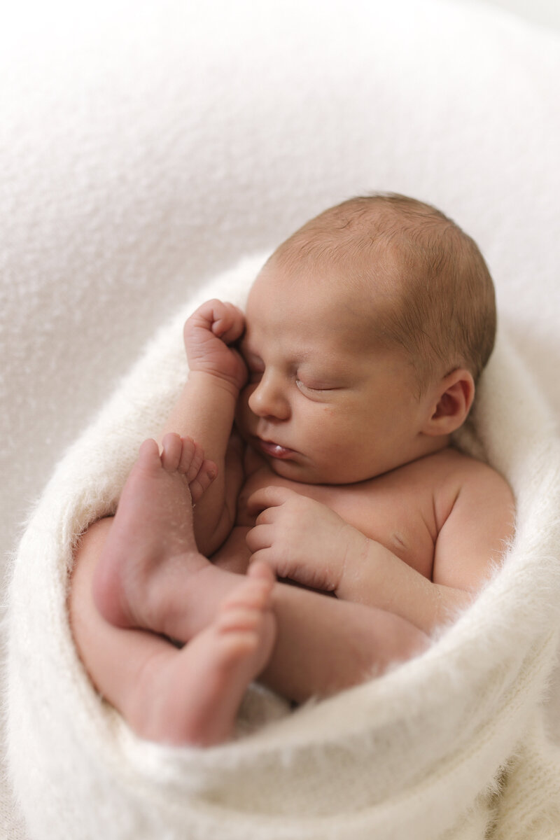 Newborn photography session in Kent by Abigail Scarfe