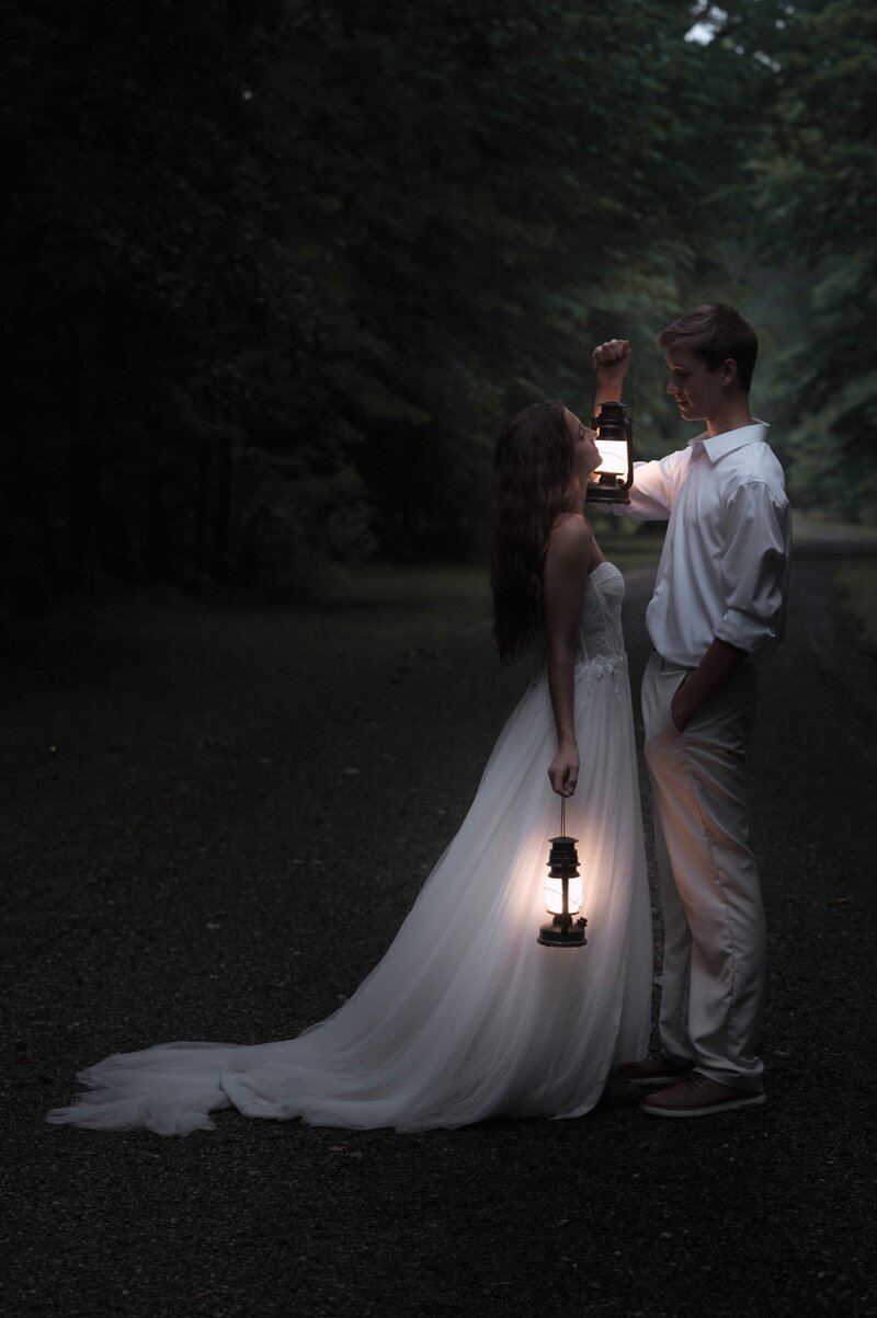 Elopement after sunset using lanterns to light the way. 