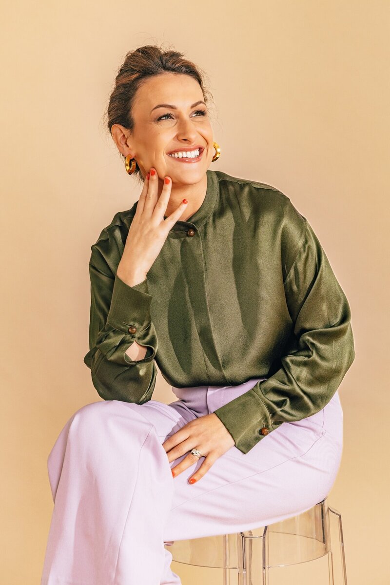 Julia Korn in Green Blouse Looking Left