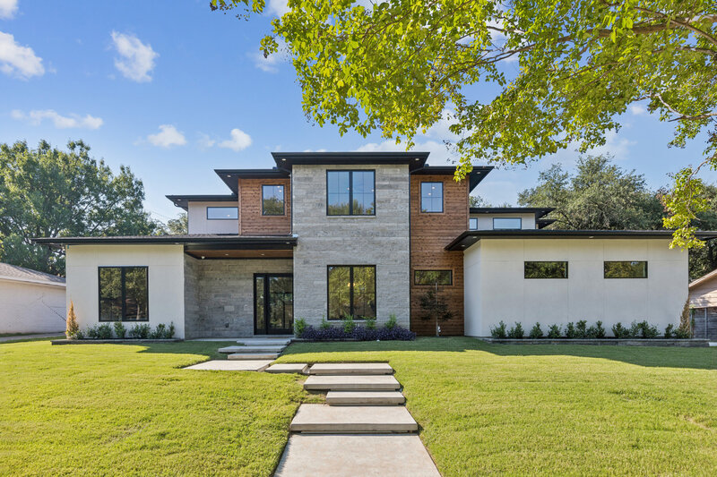 3630 Mid Pines is a modern masterpiece blends sleek lines, natural stone, and warm wood accents for a striking curb appeal. The expansive windows and clean design create a perfect balance of contemporary style and inviting comfort.