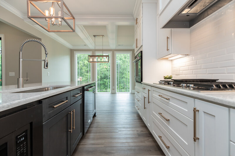 James Alexander Homes, custom home builder, North Carolina, family-owned builders, bespoke homes, semi-custom homes, speculative homes, luxury home builders, custom home designs, handcrafted homes, intentional design, timeless craftsmanship, personalized home building, home design services, pre-designed homes, dream homes, tailored living spaces, unique floor plans, quality construction, affordable custom homes, curated finishes, residential construction North Carolina, energy-efficient homes, family-friendly designs, signature house plans, cost-effective home building, custom floor plans, craftsmanship, home building experience, home financing options, bespoke design process, dream home financing, detailed design discussions, semi-custom home builds, signature designs, unique living spaces, intentional home design, timeless home architecture, home building consultation, exceptional craftsmanship, tailored aesthetics, dream home creation, custom finishes, built-for-family homes