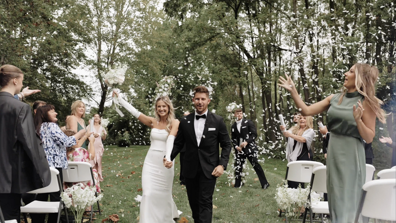 Bride and groom walk down the aisle at Mount Vernon Estate in Ashland Ohio