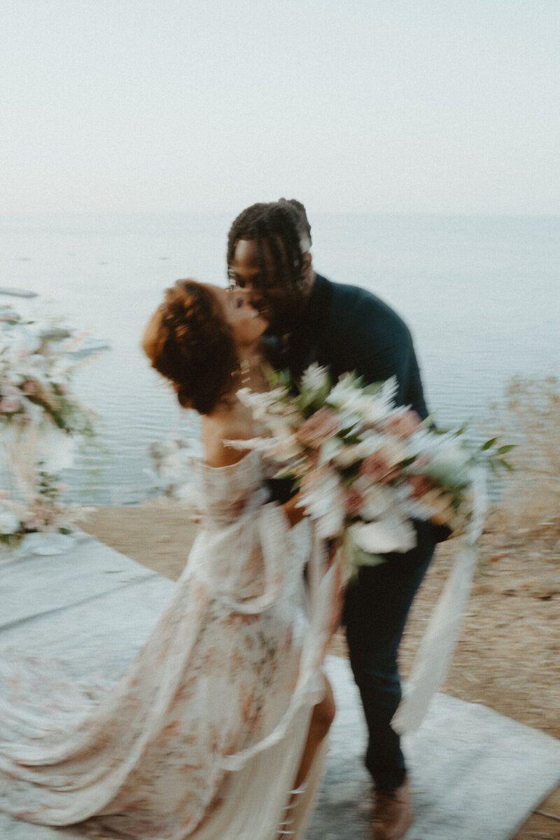 bride and groom kissing