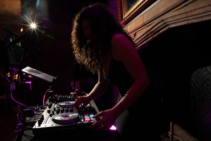 DJ mixing music for an event