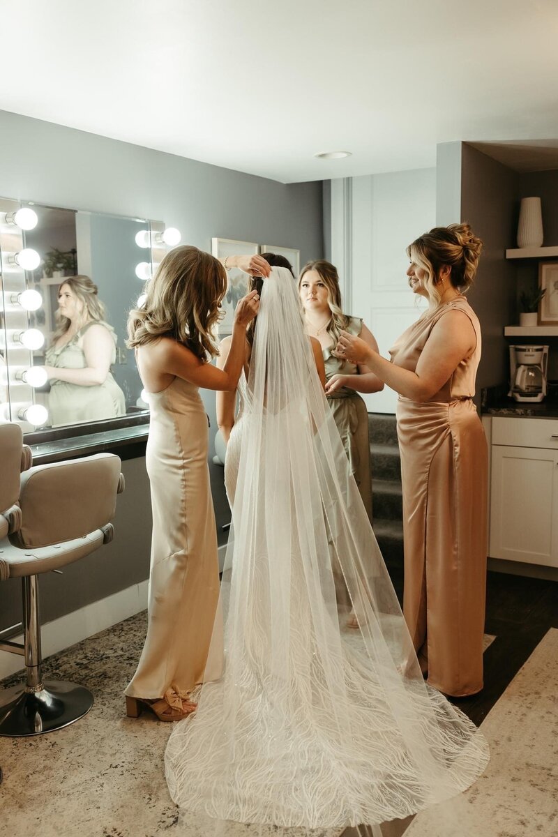 photo of a bride getting ready in the preparation cottage at Willowbrook Weddings in Volant, PA