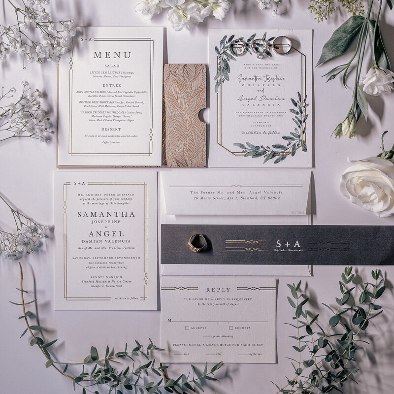 Flat lay of wedding invitation suite for Connecticut wedding