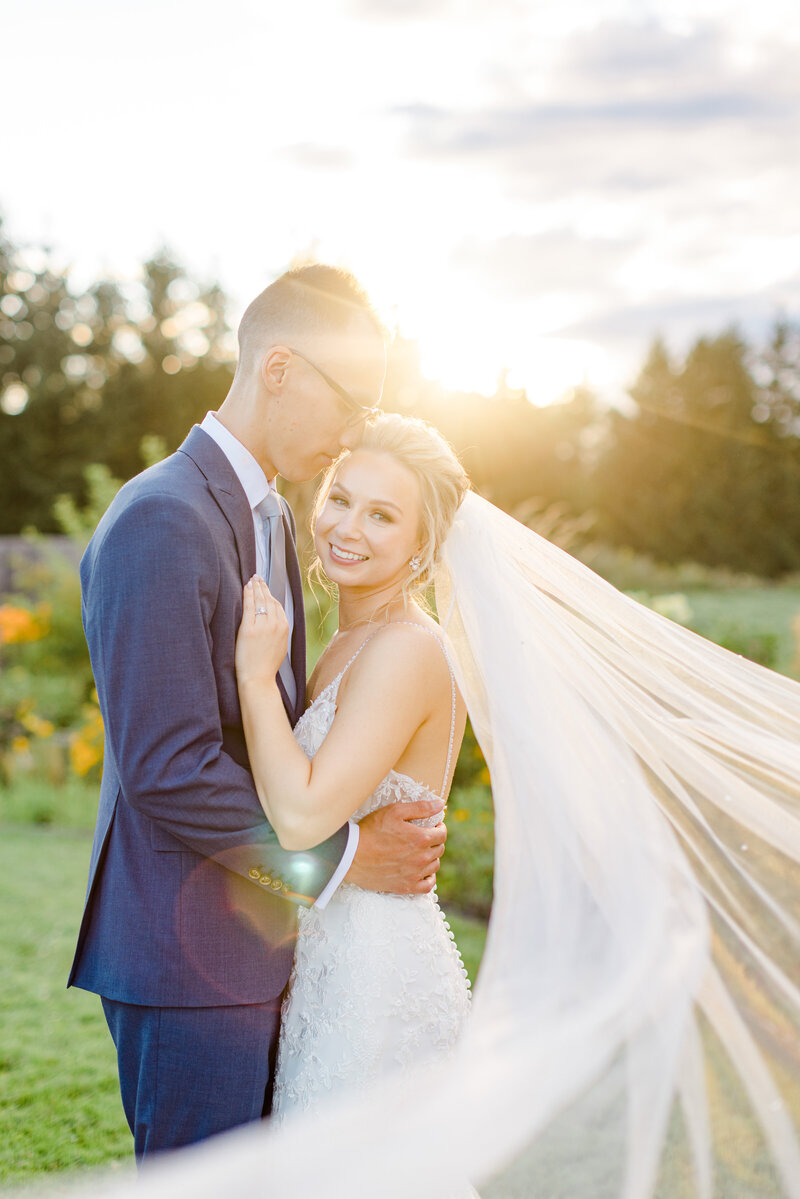 Grey Loft Studio - Bethany and Luc Barette - Wedding Photography Wedding Videography Ottawa - Morgan and Chris wedding at the Wakefield Grand - couple cheers with champagne after wedding ceremony