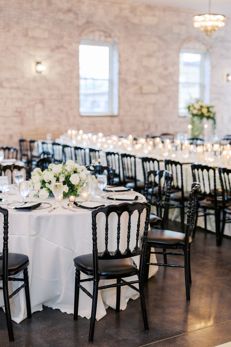 an elegant long table settings at the luxe room at grbic events wedding venue in st. louis