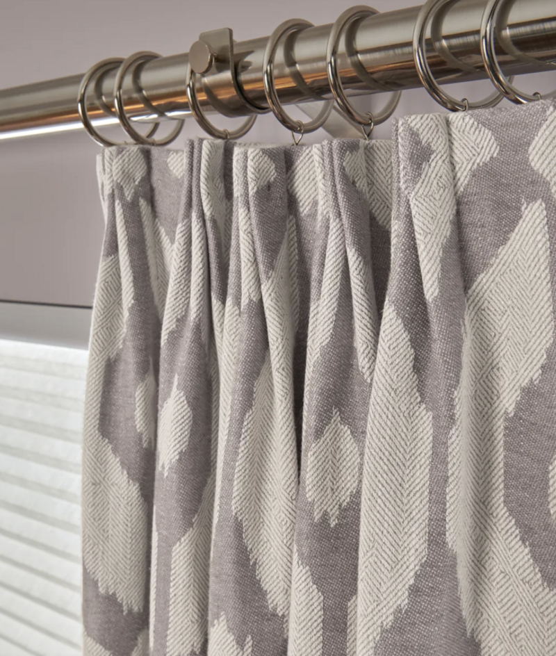 Grey and white indoor drapes