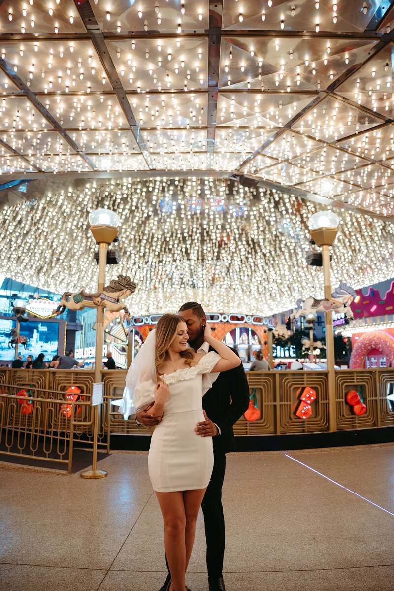 Bride and groom Vegas lights