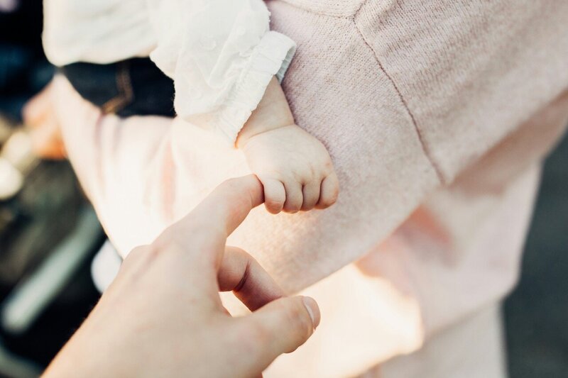 Baby holding hand