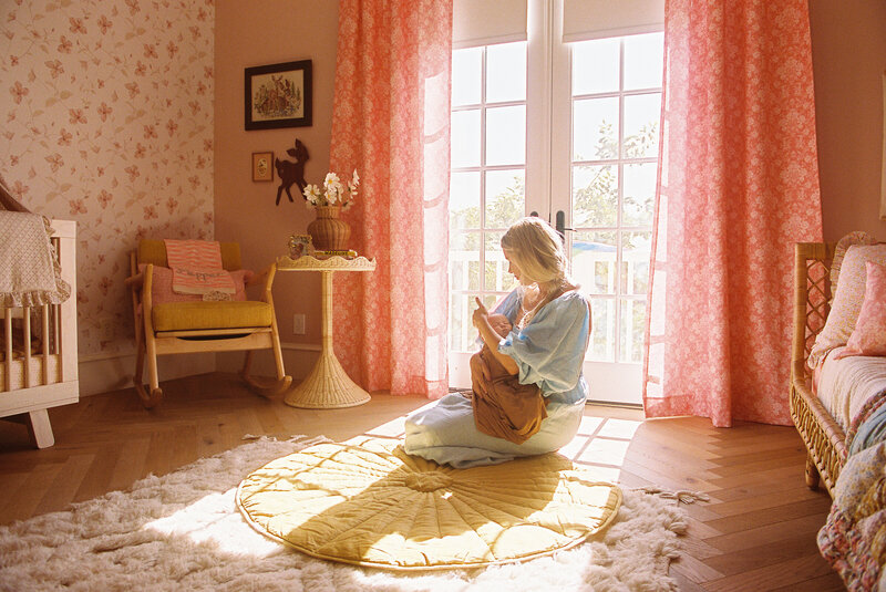 Film photograph of a newborn and parents in natural light.