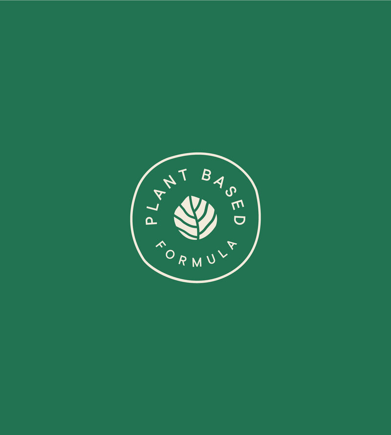 Round beige icon with text reading Plant Based Formula wrapping around icon of leaf on dark green background