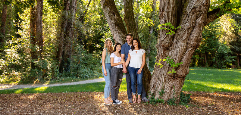 Natural and beautiful family portraits in a park in Seattle, Washington by Nancy Chabot