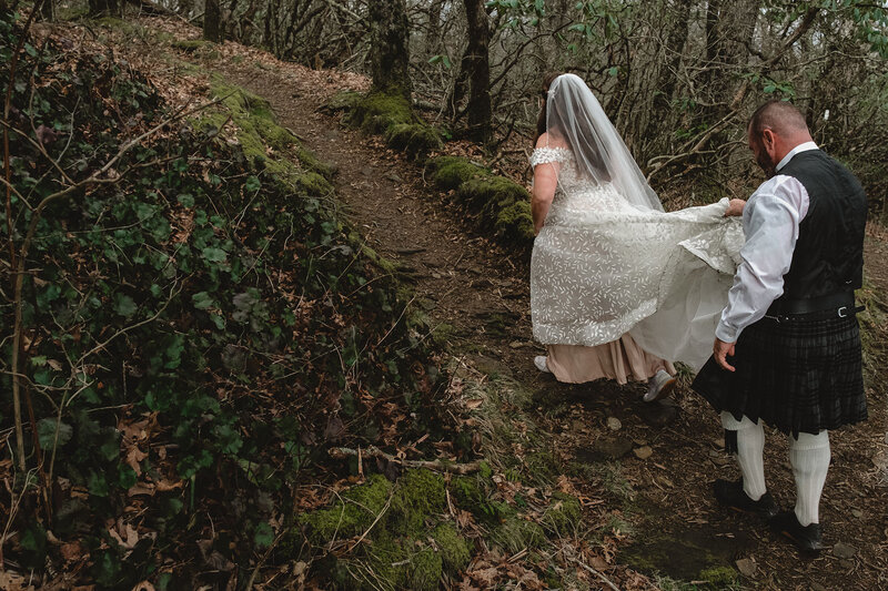 Hiking wedding couple shares a first dance with each other