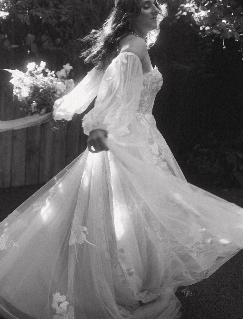 bride twirls in dress