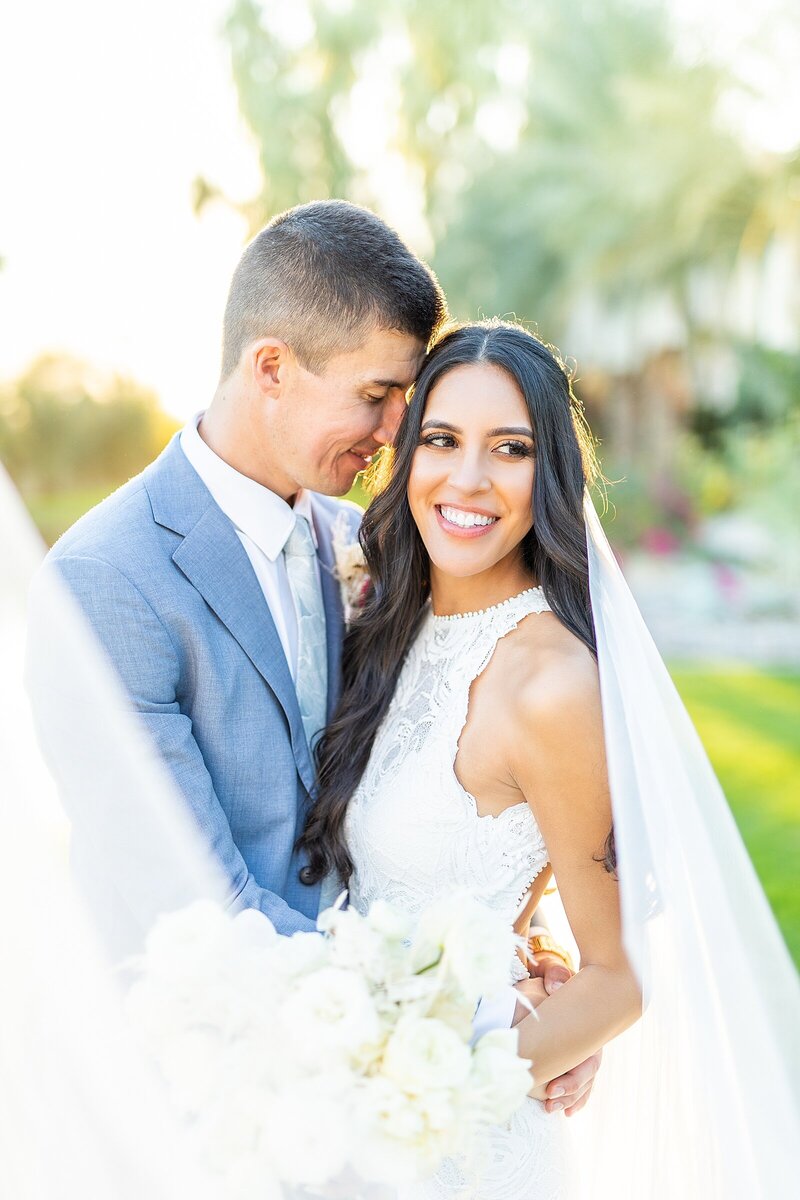 Bride wearing Grace Wears Lace Dress and groom at The Old Polo Estate in Coachella, California- Sherr Weddings