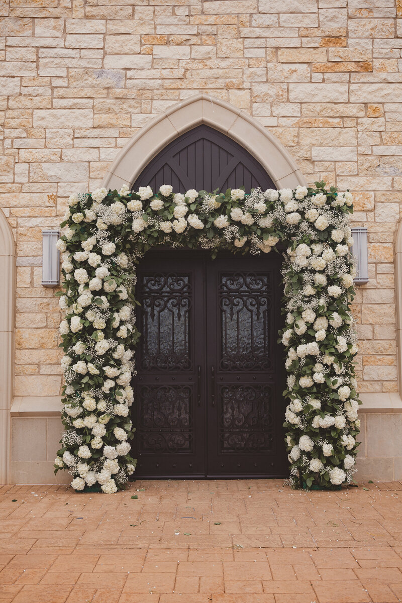 Swank Soiree Dallas Wedding Planner Jamie and Dwayne at The Bowden Wedding Venue - Floral Arbor with white roses