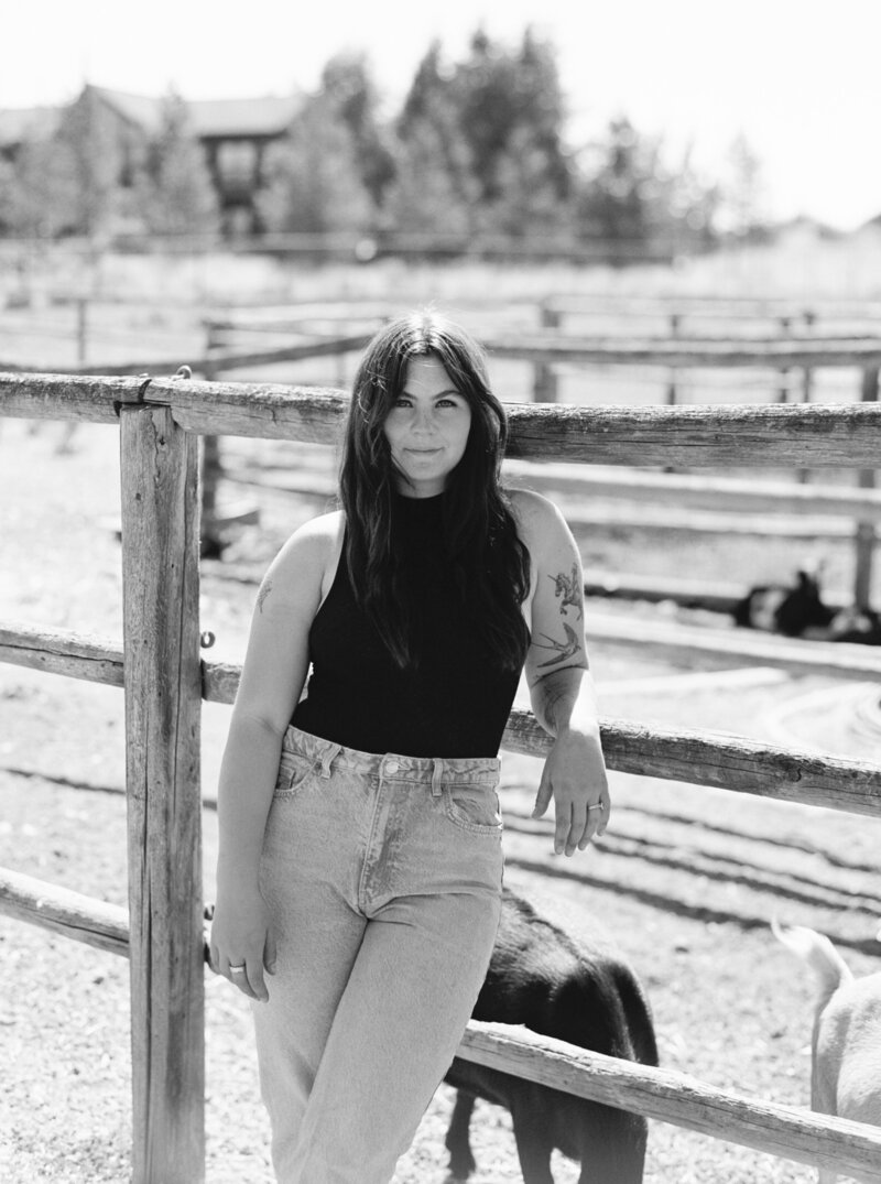 female photographer at her ranch in Bend, Oregon surrounded by her farm animals