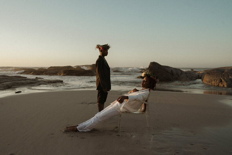 bride and groom posing on the beach at their africa elopement