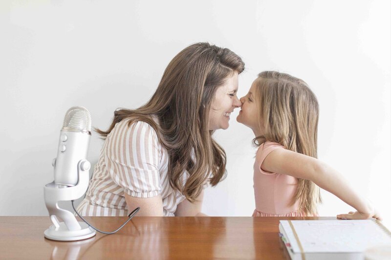 mom and desk doing nose kisses with daughter