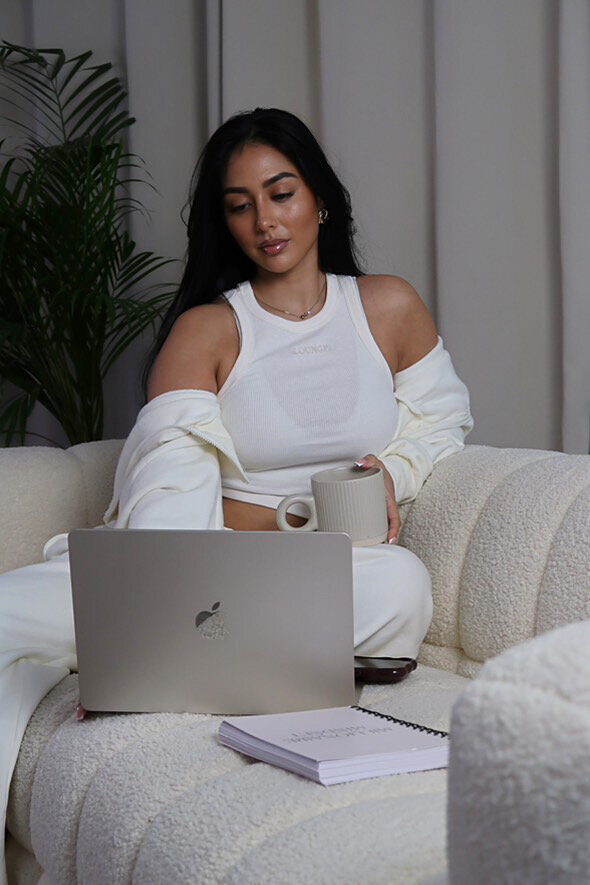 Women at the desk with a laptop