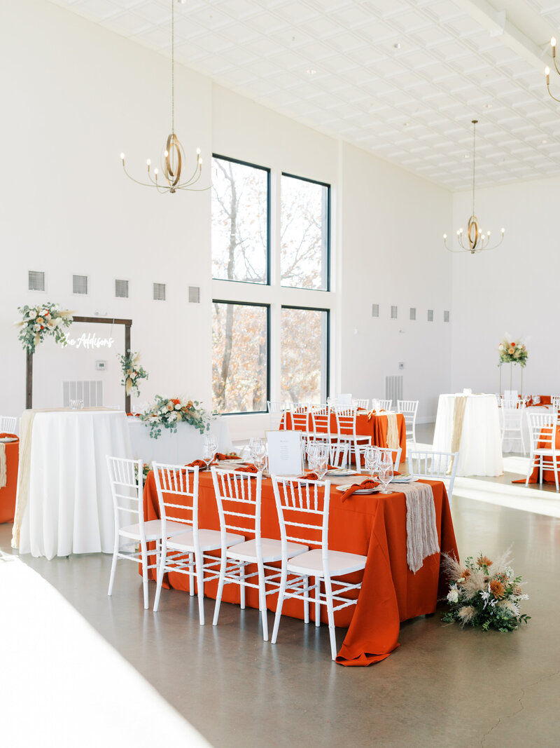 reception hall with red tableclothes