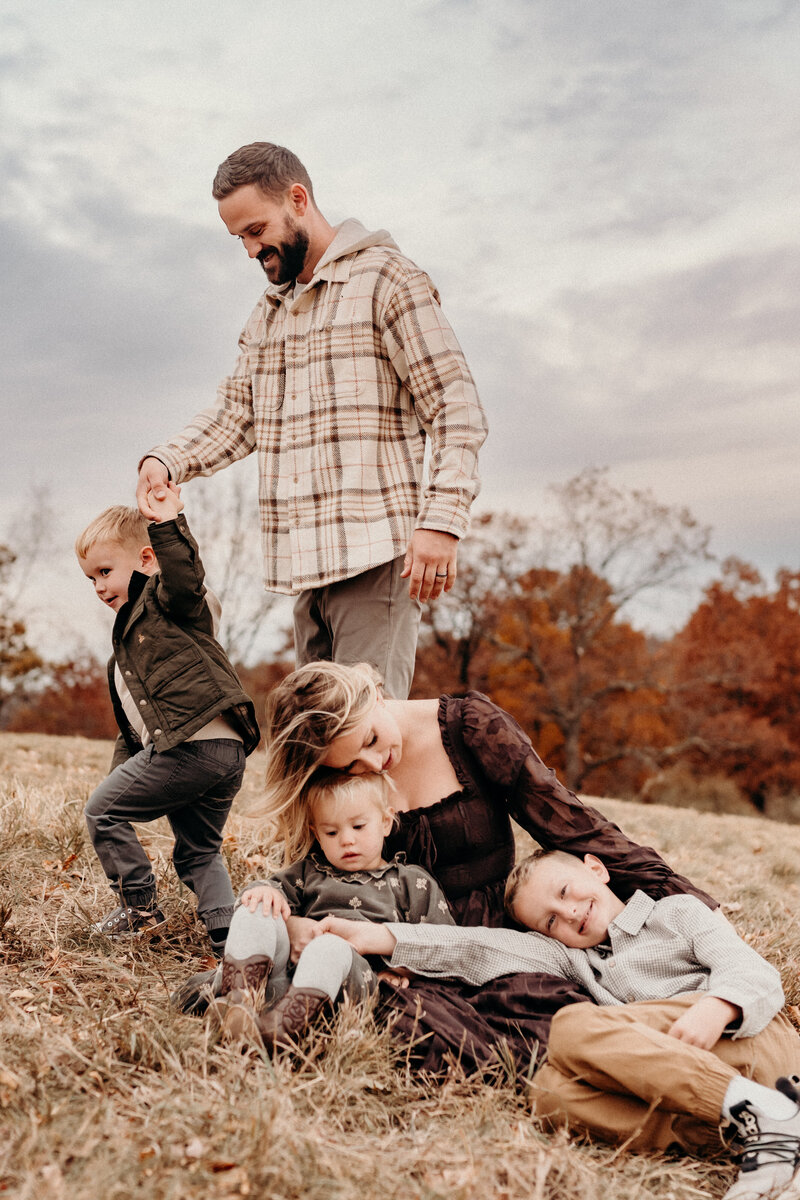 group of photographers taking photos of family