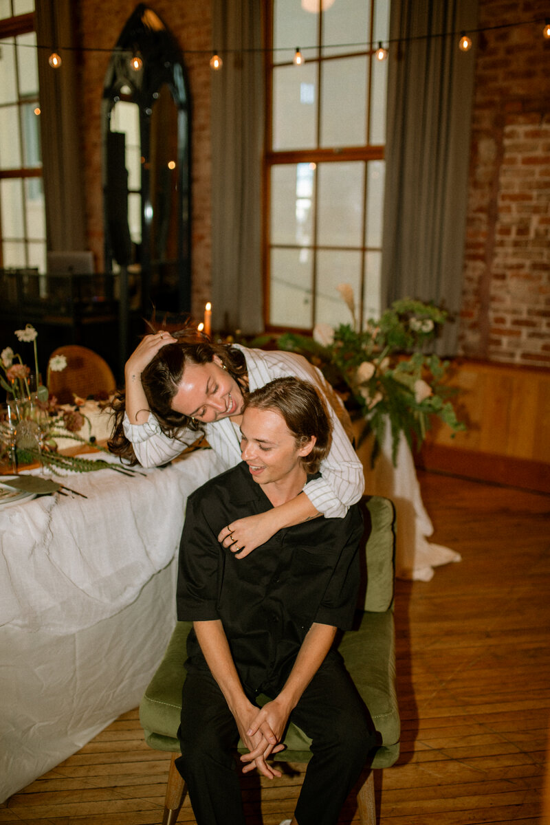Luxury wedding reception featuring floral arrangements and sophisticated table settings for an intimate celebration.