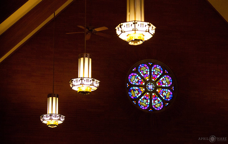 Stained-Glass-Window-and-Chandelier-Lighting-at-Sacred-Heart-of-Jesus-Boulder-Colorado