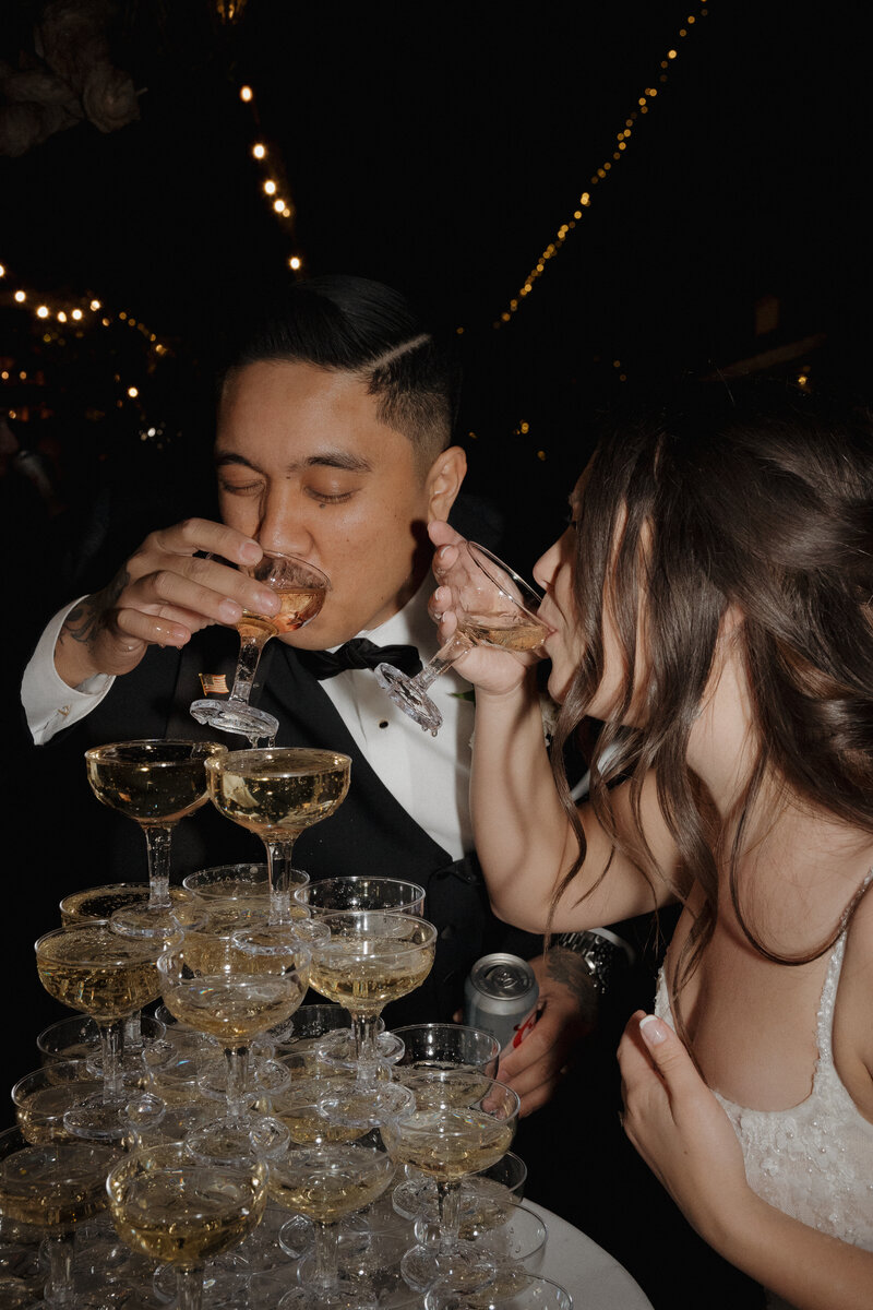 The bride and groom celebrate their new wedding rings