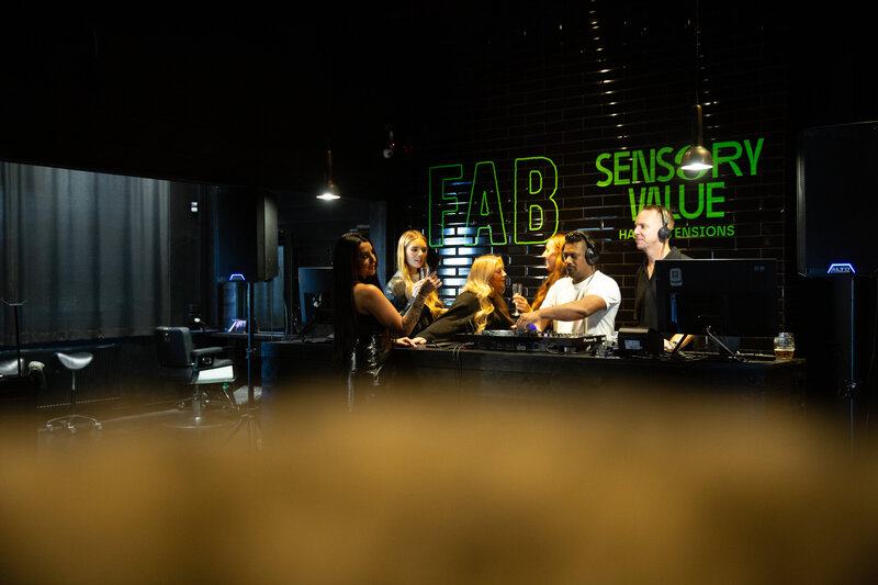 Trainer doing box jumps