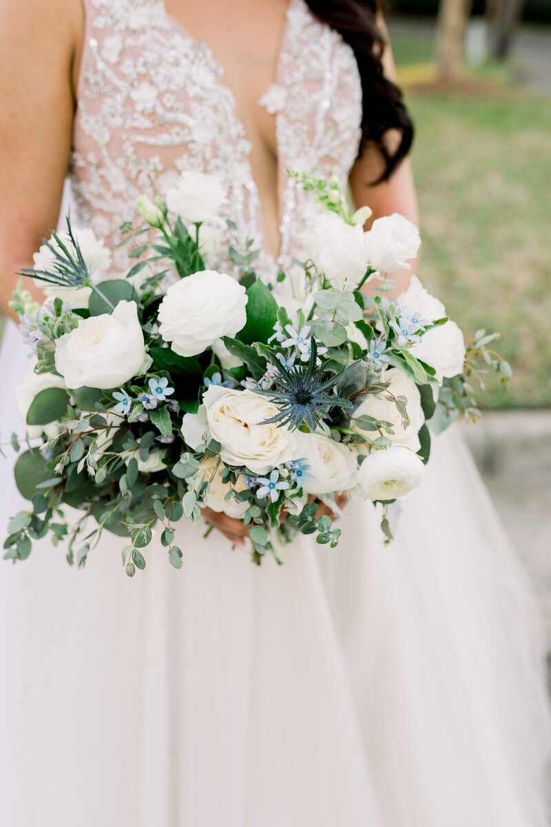 blue, ivory, white and greenery filled bouquet