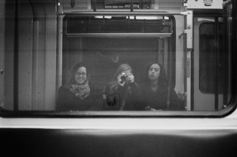 alberta photographer taking photo of self in train window