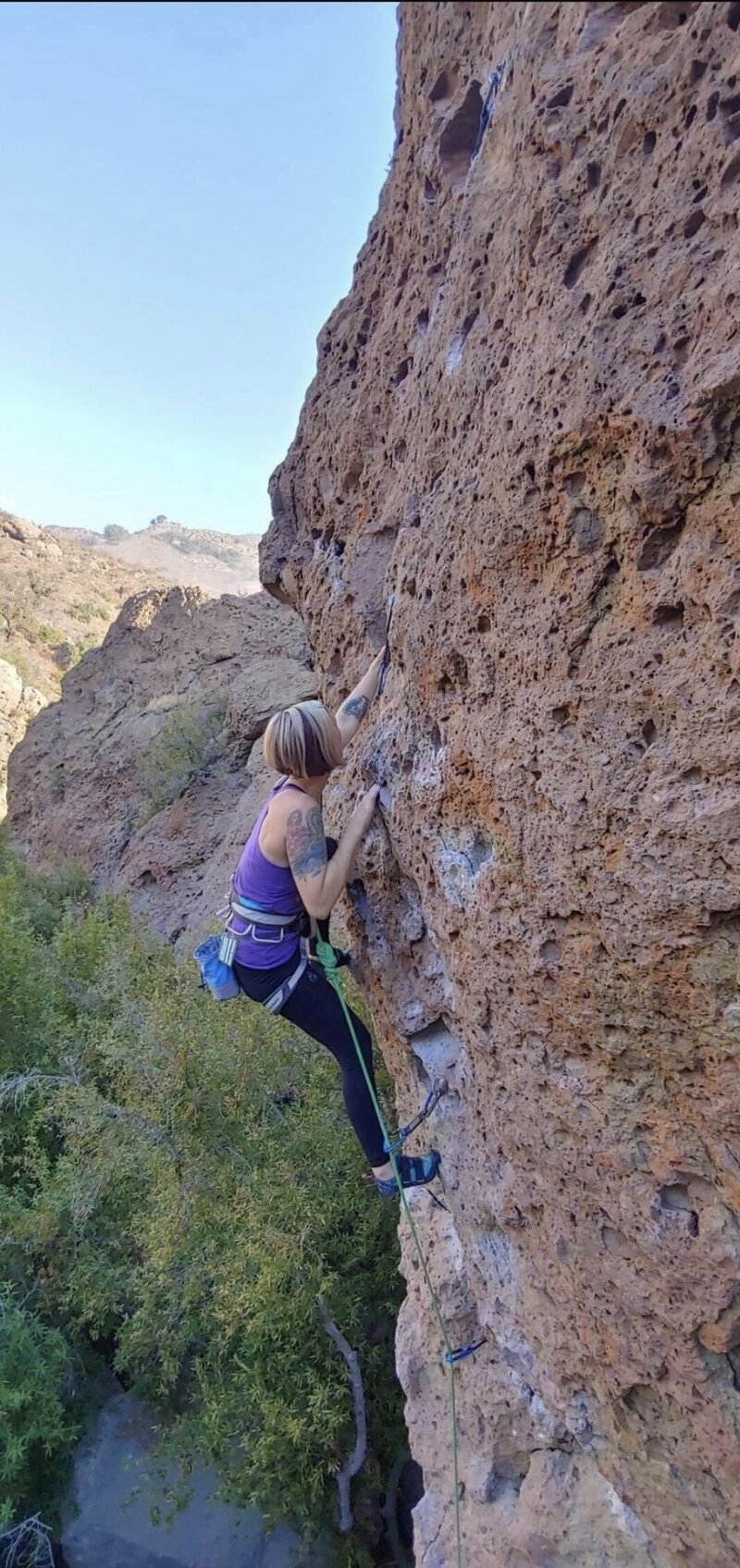 Woman rock climbing