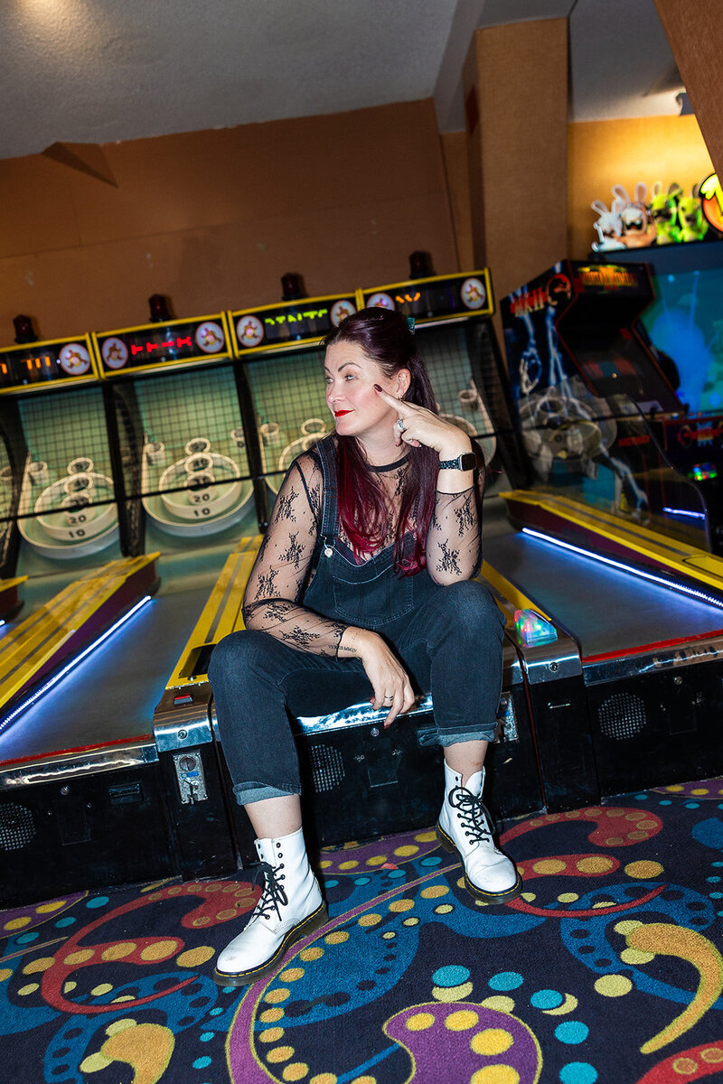 heather taylor of taylor made photography having fun at arcade in las vegas