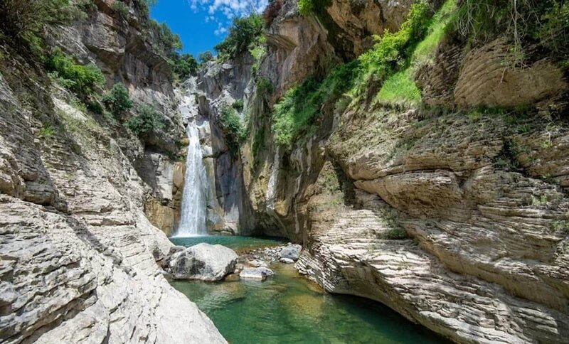 Natural waterfalls adding to the retreat's serene atmosphere.