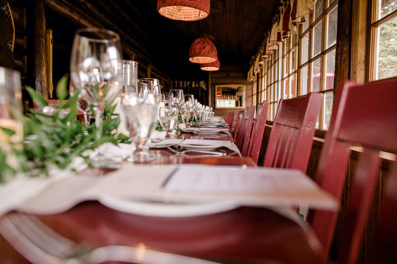 A detailed photograph showcasing the elegant reception layout at Storm Mountain Lodge, highlighting the intimate and rustic charm of this unique wedding venue.