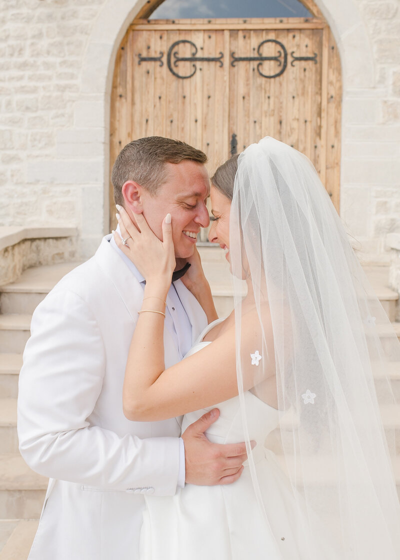 wedding couple walking in front of chateau in south of france