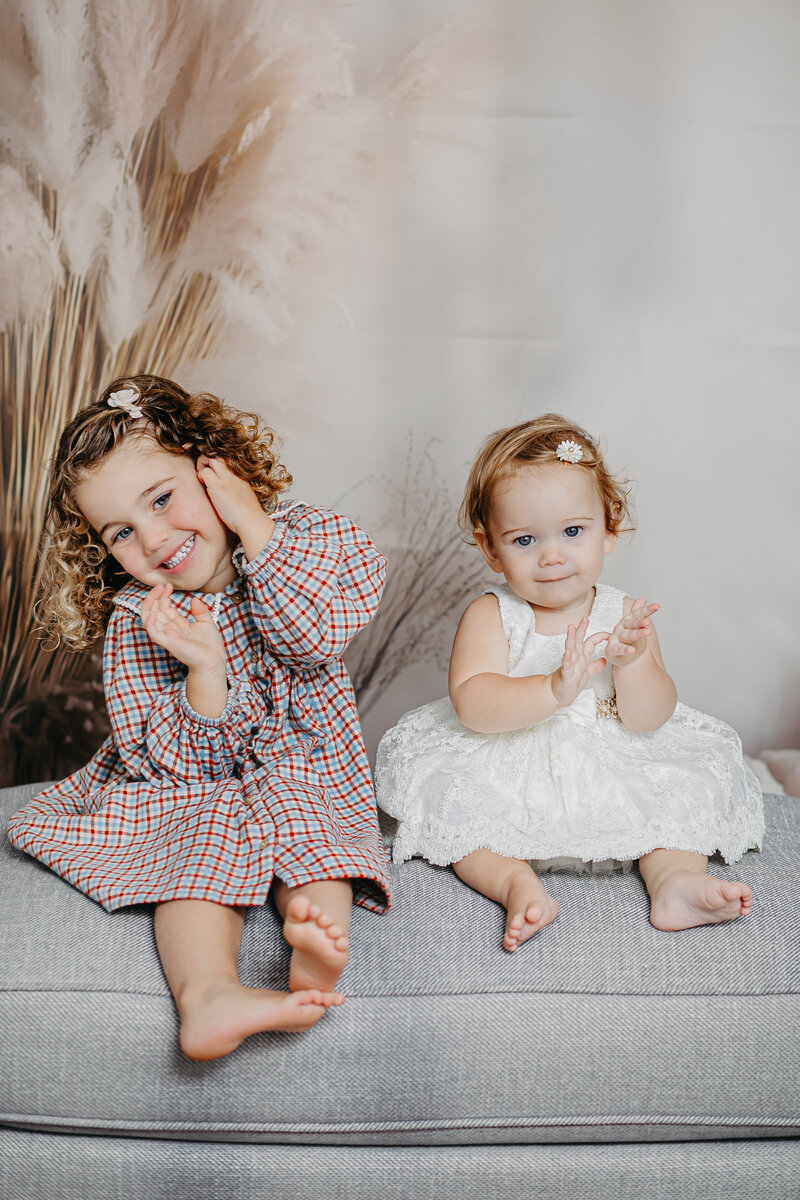 Studio family photoshoot in Dublin, capturing warm smiles and natural connection in a clean, modern setting.
