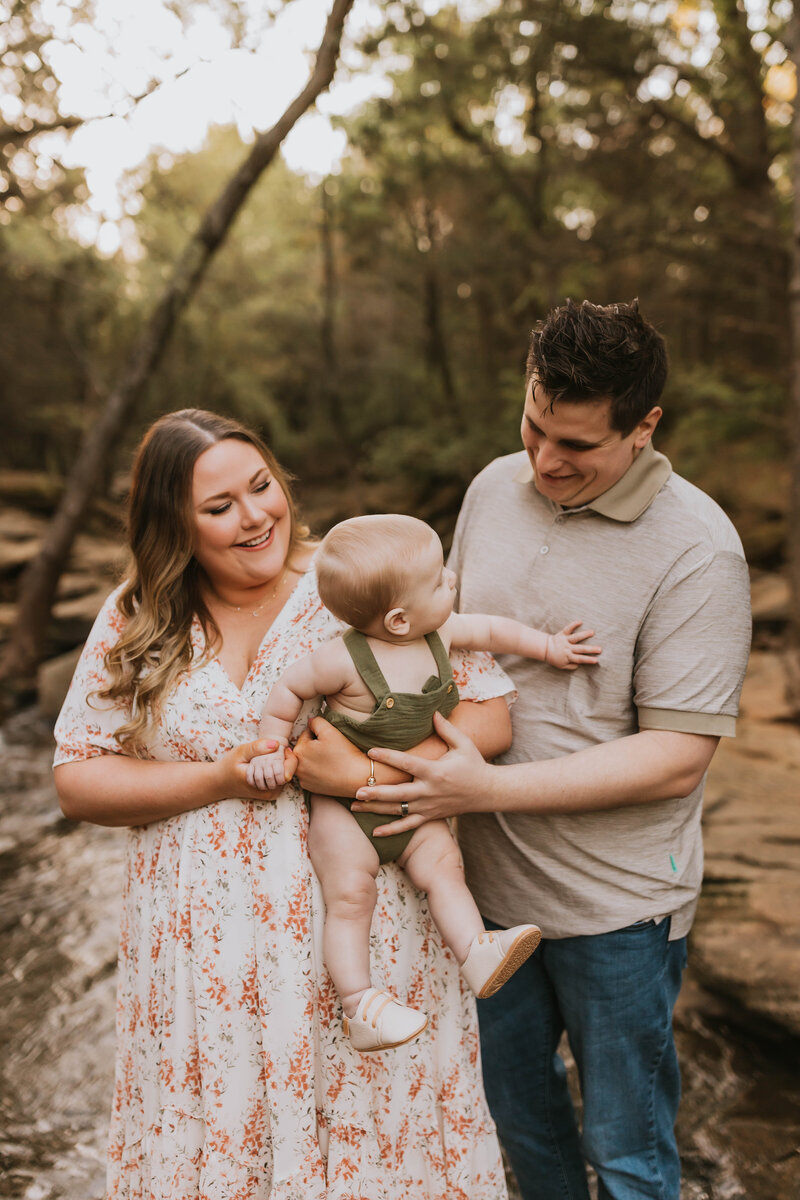 Family of three at a creek in Flower Mound, TX