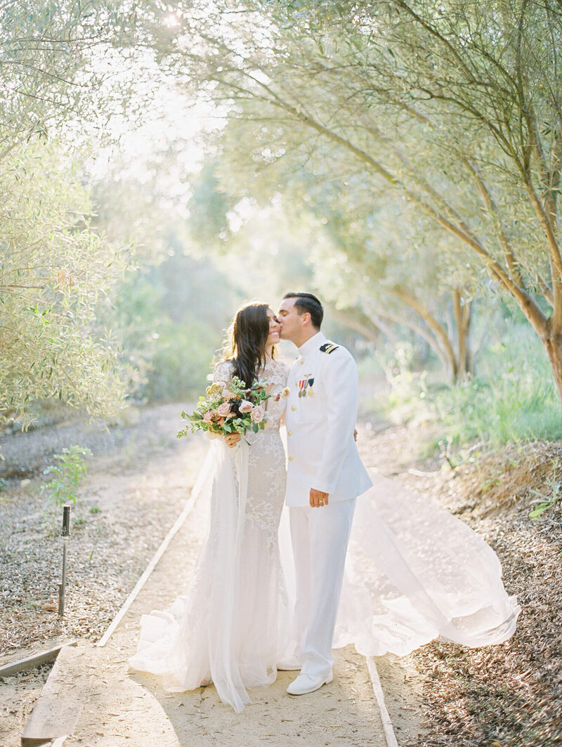 bride and groom portraits in forest area at Rancho Valencia in San Diego