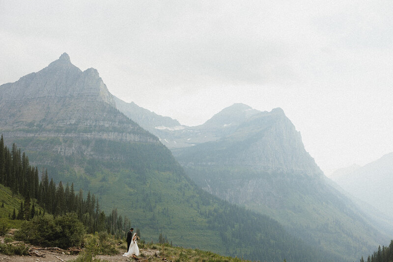 couple exchanging vows in front of aframe