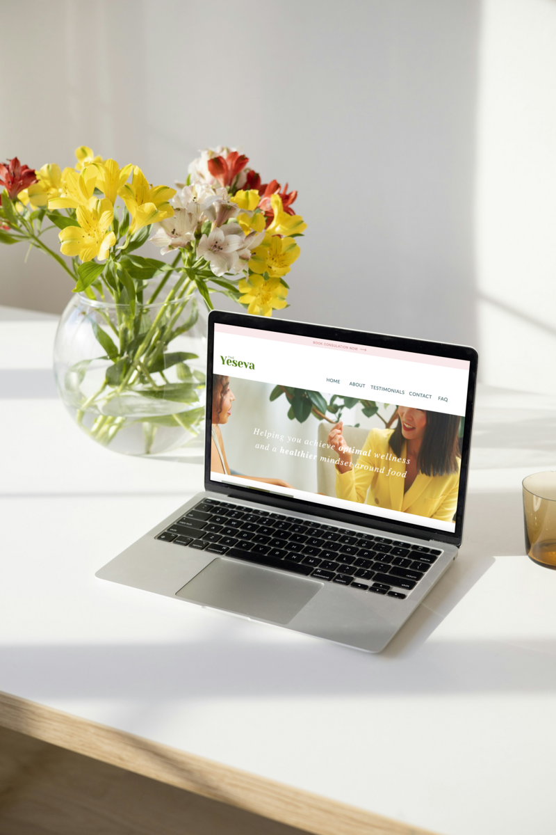 Laptop displaying a website tailored for a nutritionist