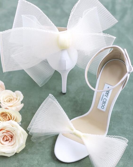Four wedding guest favors.