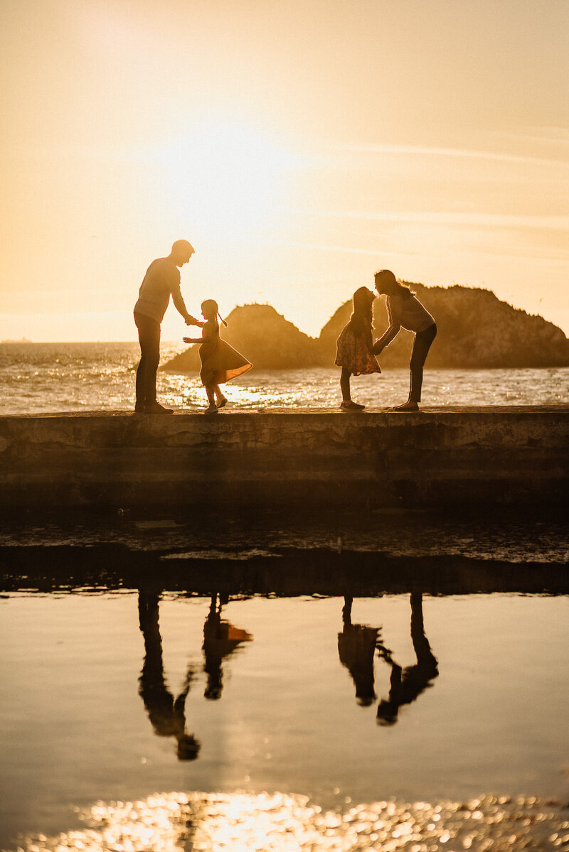 San Francisco family at sunset at Sutro Baths Beach