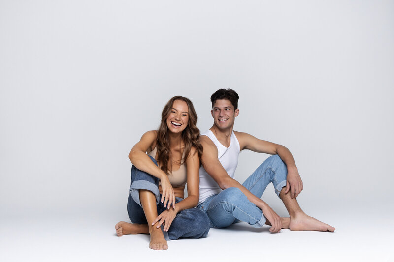 woman and man confidently smiling at camera