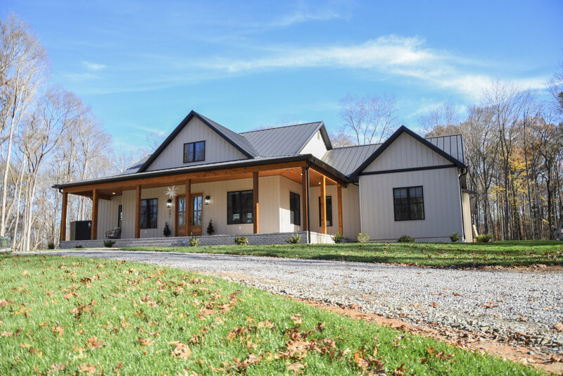 Timber frame lodge, wrap around porch tin roof