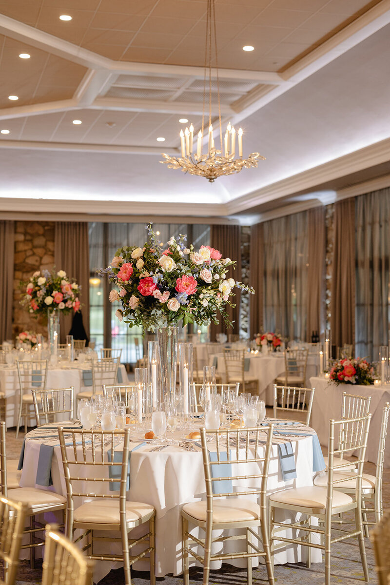 Reception tables decorated with flowers at Elbow Country Club in New Jersey